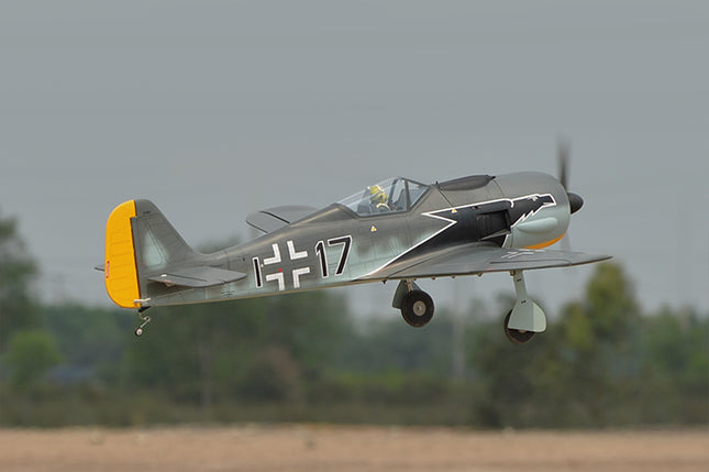 Phoenix Model FOCKE WULF WW2 Model airplane with a German Luftwaffe insignia flying against a blurred background