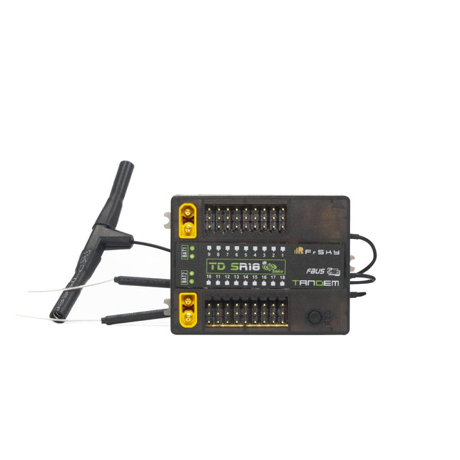 FrSky electronic module with antennas on a white background
