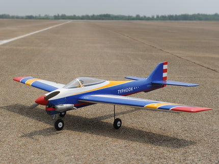 Colorful Phoenix Model TYPHOON 59" Size ARF model airplane on a runway with a clear sky background