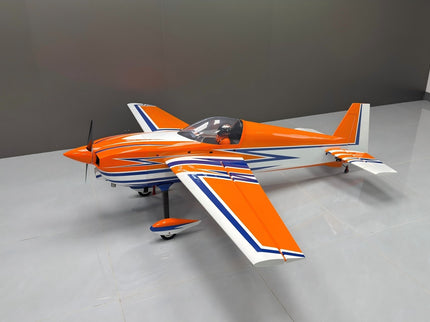 Orange and blue model airplane on a gray floor