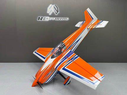 Orange and white RC airplane with blue accents on a gray surface, branded 'RC Plane' in the background.