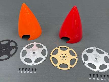 Set of spinners and circular metal components on a gray background