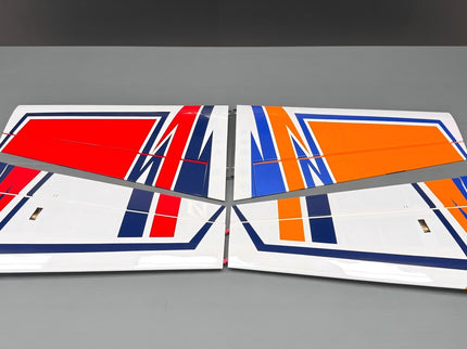 Colorful wings of rc skywing laser on a gray background