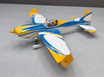 Colorful model airplane on a gray surface