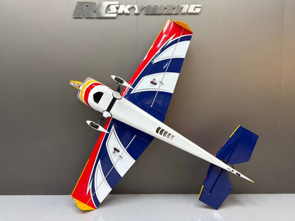 Model airplane with red, white, and blue colors on a gray background