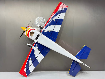 Model airplane with red, white, and blue design on a gray background