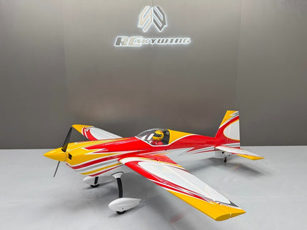 Model airplane with red, yellow, and white colors on a gray background with a logo above.