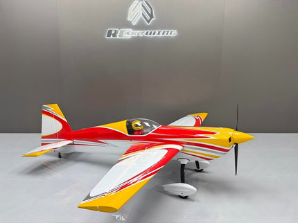 Model airplane with red and yellow design on a gray background