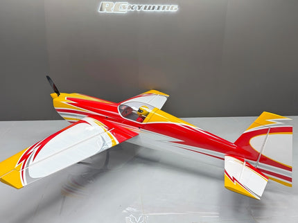 Model airplane with red, white, and blue design on a gray background