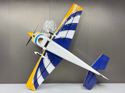 Model airplane with blue and yellow design on a gray background
