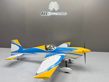 Model airplane on a gray surface with a branded background