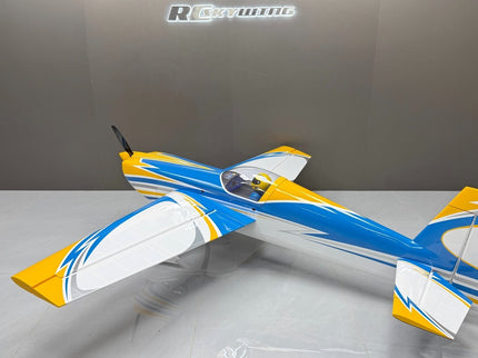 Model airplane with blue and yellow design on a gray background