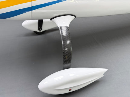 Close-up of an airplane landing gear on a gray background