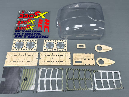 Collection of motorcycle parts and stickers on a gray background