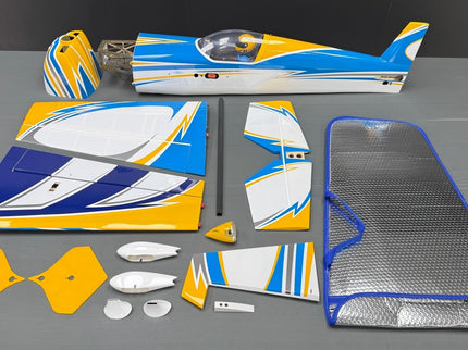 Model airplane parts and accessories on a gray surface