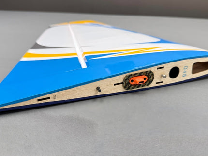 Model wing on a gray surface
