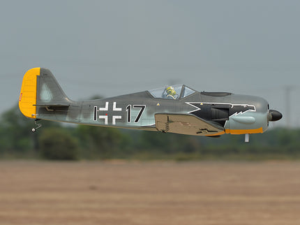 Phoenix Model FOCKE WULF WW2 Model airplane with a German Luftwaffe insignia flying over a field