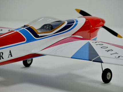 Phoenix Model AURORA 59" ARF Model airplane with red, white, and blue colors on a light gray background