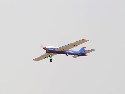 Phoenix Model TYPHOON 59" Size ARF Small model airplane flying against a clear sky