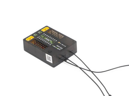 Black electronic device with wires on a white background