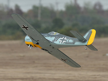 Phoenix Model FOCKE WULF WW2 Model airplane with a German Luftwaffe insignia flying over a field.