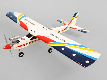 Phoenix Model Domino 62” Trainer Model airplane with colorful design on a gray background