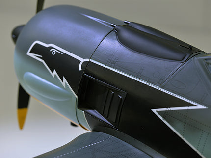 Close-up of a Phoenix Model FOCKE WULF WW2 model airplane with a detailed design on the wing