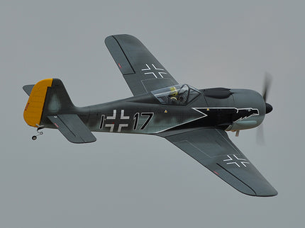 Phoenix Model FOCKE WULF WW2 Vintage military airplane with a distinctive emblem flying against a gray sky