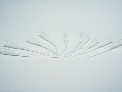 Clear plastic straws on a white background
