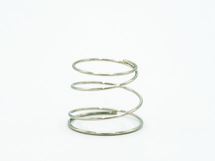 Silver spiral spring on a white background
