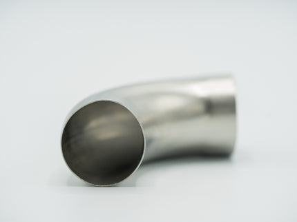 Metallic elbow pipe on a white background