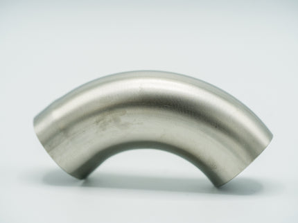 Stainless steel elbow pipe on a light gray background