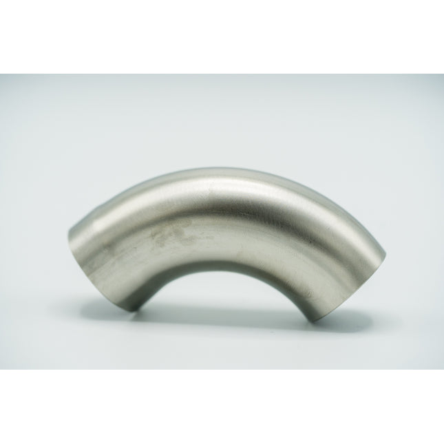 Stainless steel elbow pipe on a light gray background