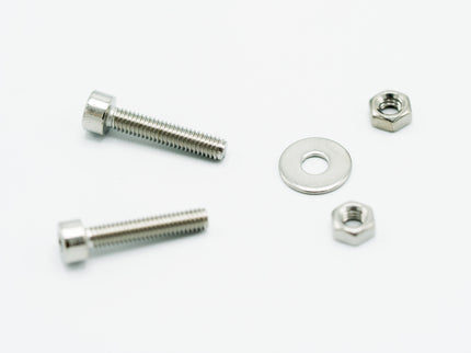 Metal ring with screws and a black rubber component on a white background, featuring 'Silencer MTV Systems' logo.
