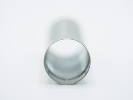 Metallic cylindrical object on a white background