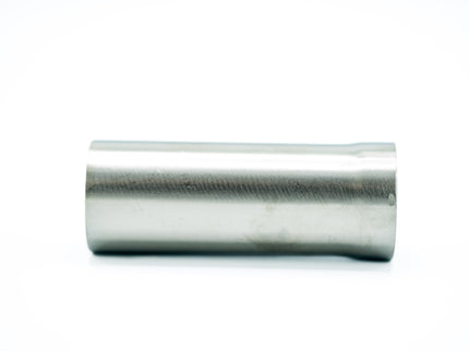 Metallic cylindrical object on a white background