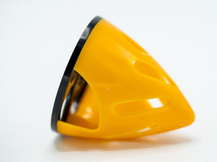 Yellow plastic cone on a white background