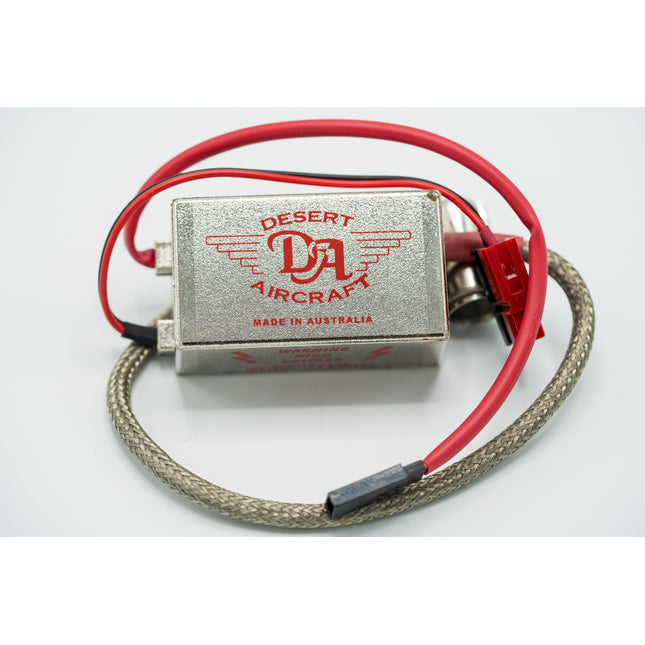 Desert Aircraft electronic component with red wiring on a white background
