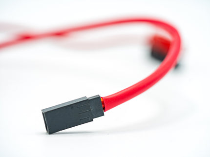 Red cable with a black connector on a white background