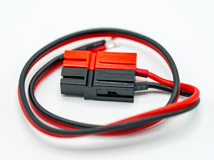 Battery connector with red and black wires on a white background
