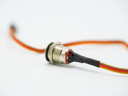 Electrical connector with red and black wires on a white background