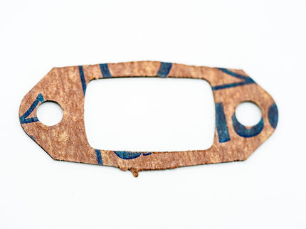 Cork gasket with blue markings on a white background
