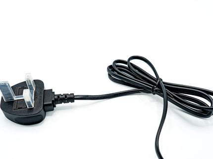Black electrical plug with a long cable on a white background