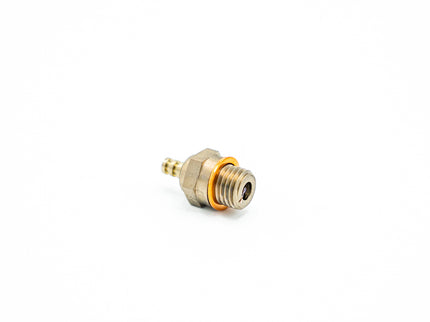 Brass fitting with gold accent on a white background