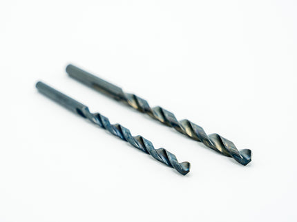 Two drill bits on a white background