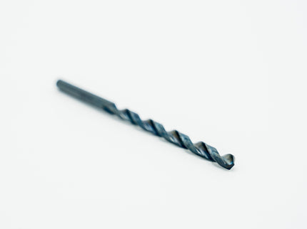 Close-up of a drill bit on a white background