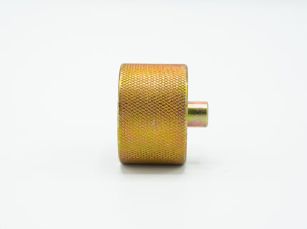 Gold metal roller on a white background