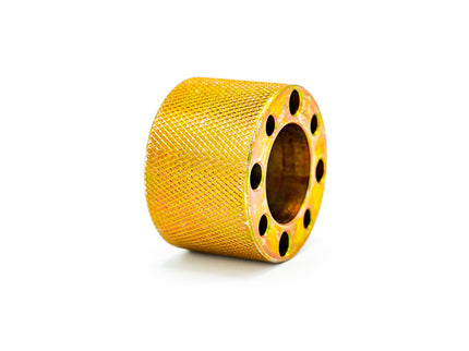Yellow metal bushing on a white background