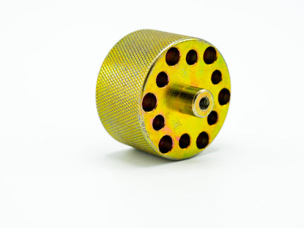 Yellow metal wheel with multiple holes on a white background