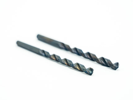 Two drill bits on a white background